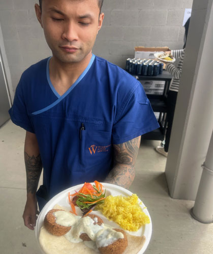 Man holding plate of food