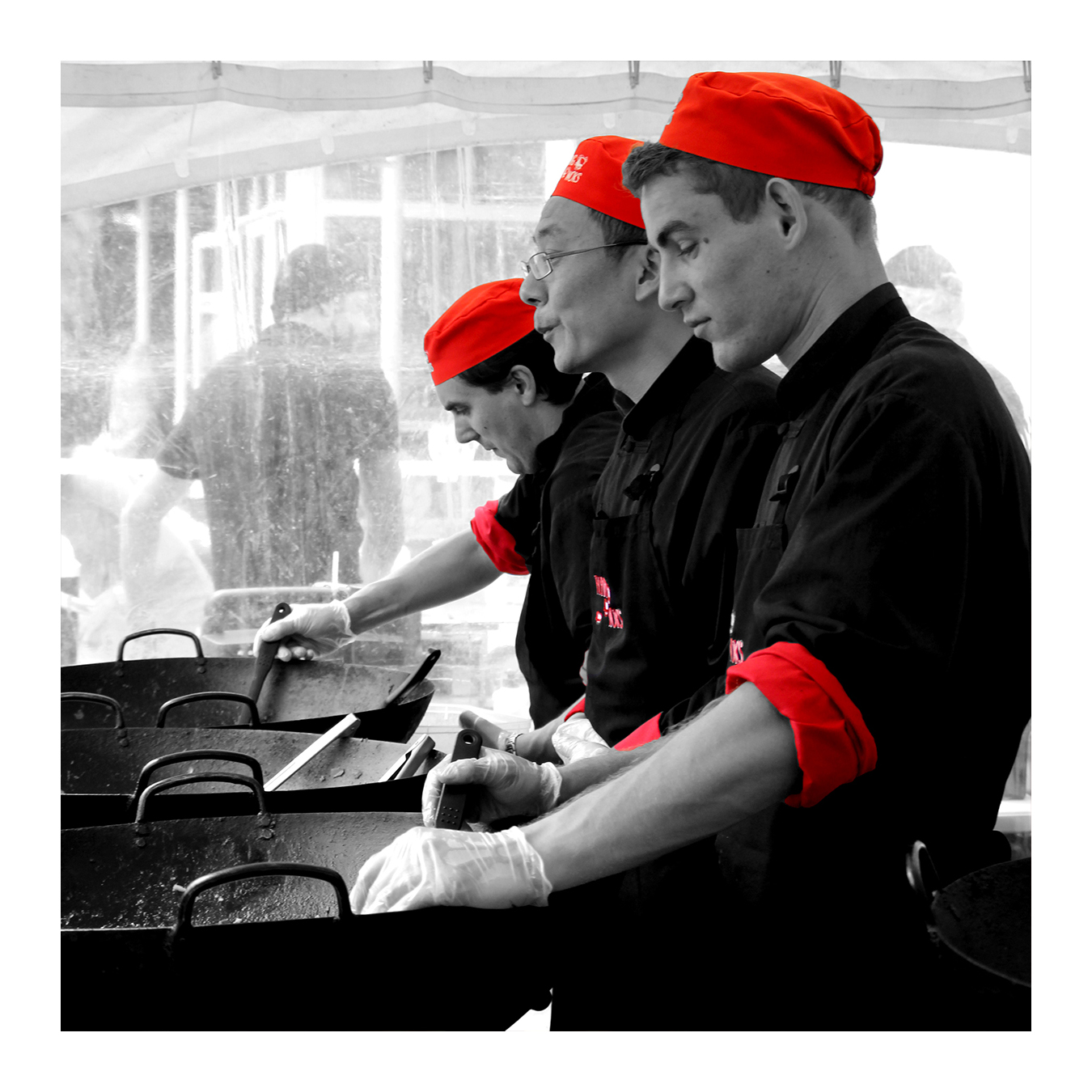 Flying Woks chefs cooking at a corporate catering event Melbourne