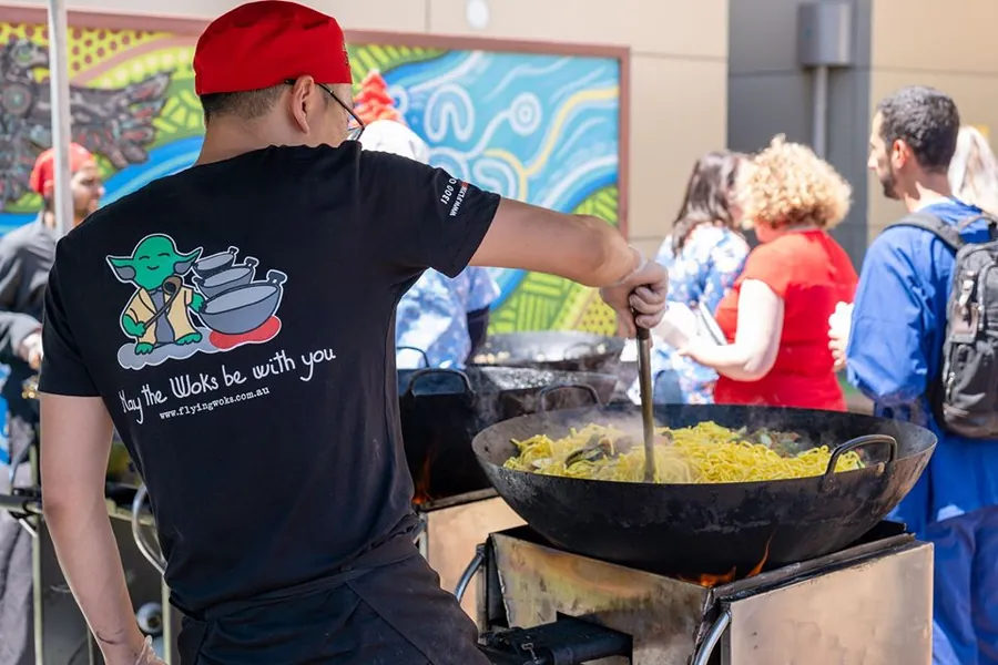 Flying Woks chef cooking at a birthday party — May the Woks be with you