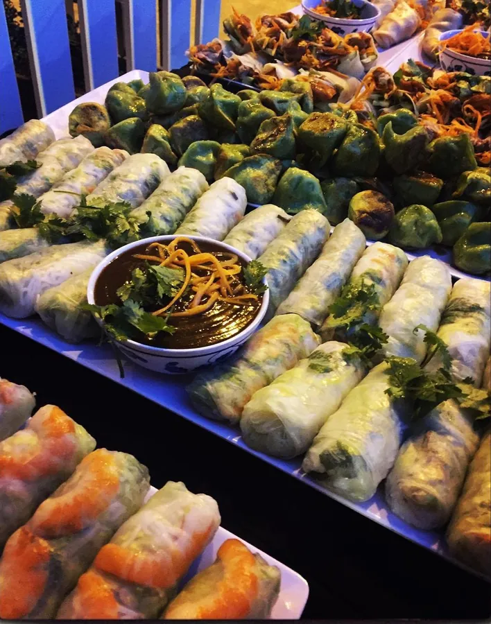 Fresh rice paper rolls and canapés at a Flying Woks birthday party