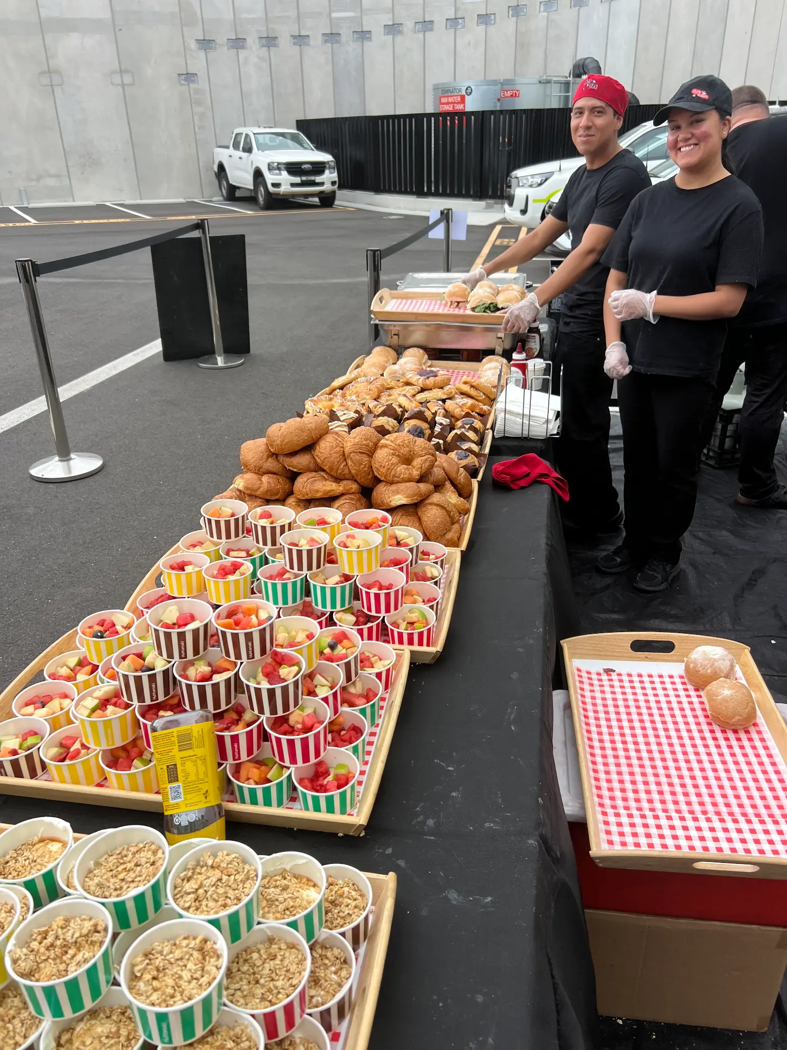 Flying Woks breakfast catering team serving full spread at Melbourne corporate event