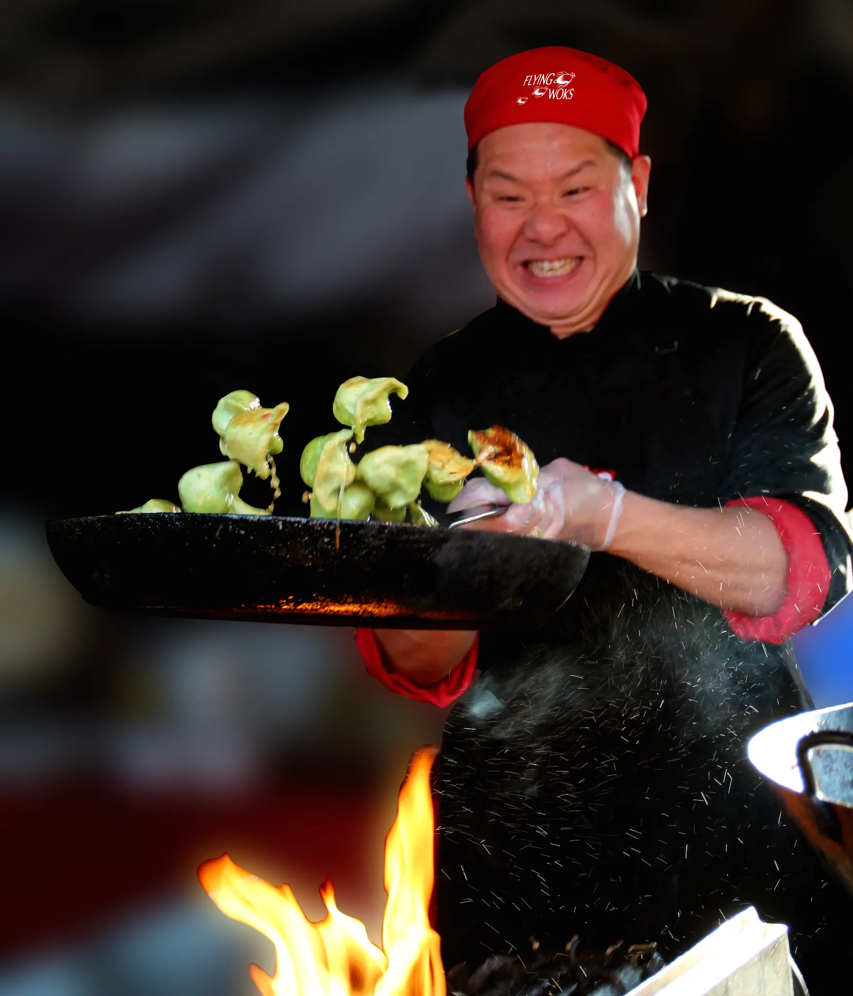 Flying Woks chef Ben Chai cooking live at a Melbourne corporate event