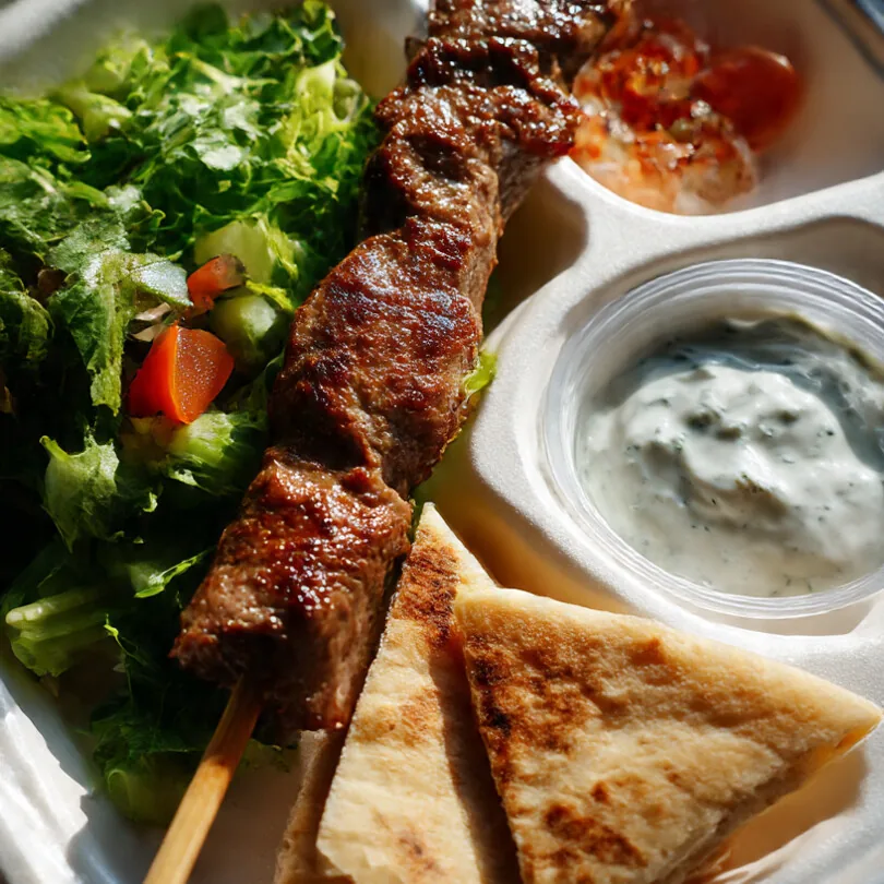 Flying Woks shish kebab plate with salad, pita and garlic sauce - Melbourne corporate catering
