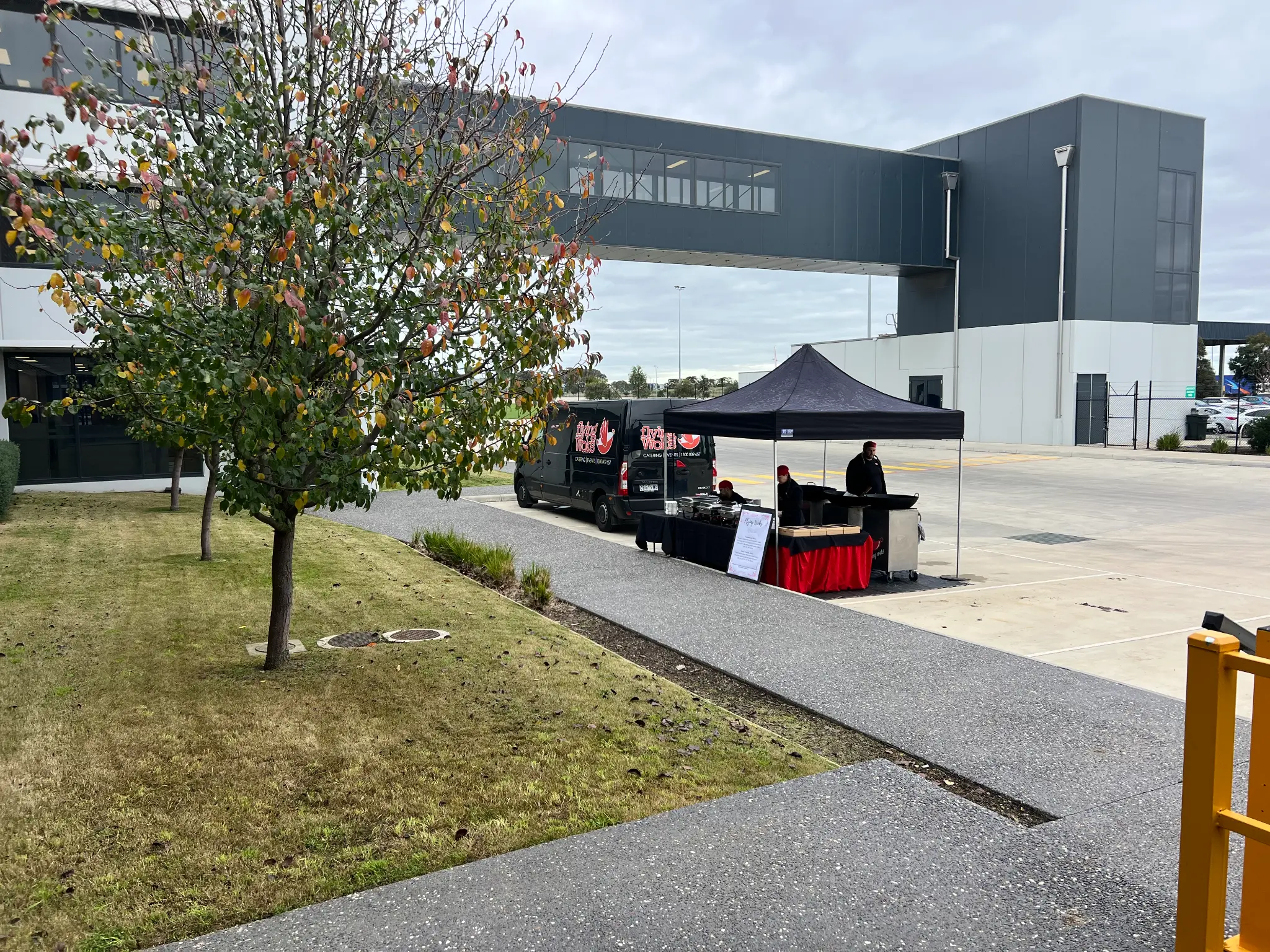 Flying Woks van and marquee set up outside a Melbourne warehouse for a corporate doughnut day