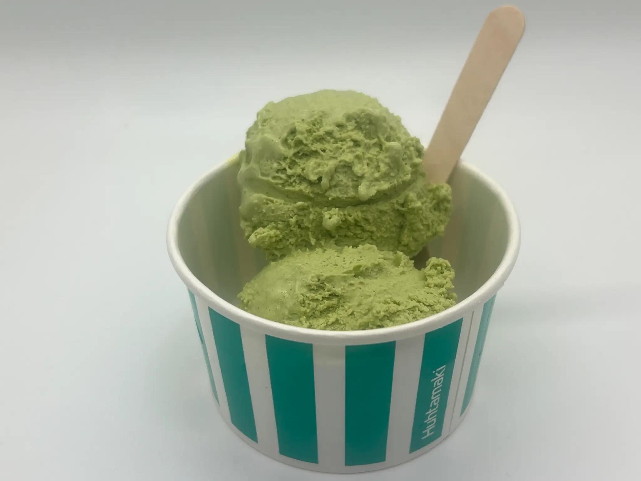 Scoops of green tea gelato in a Flying Woks cup